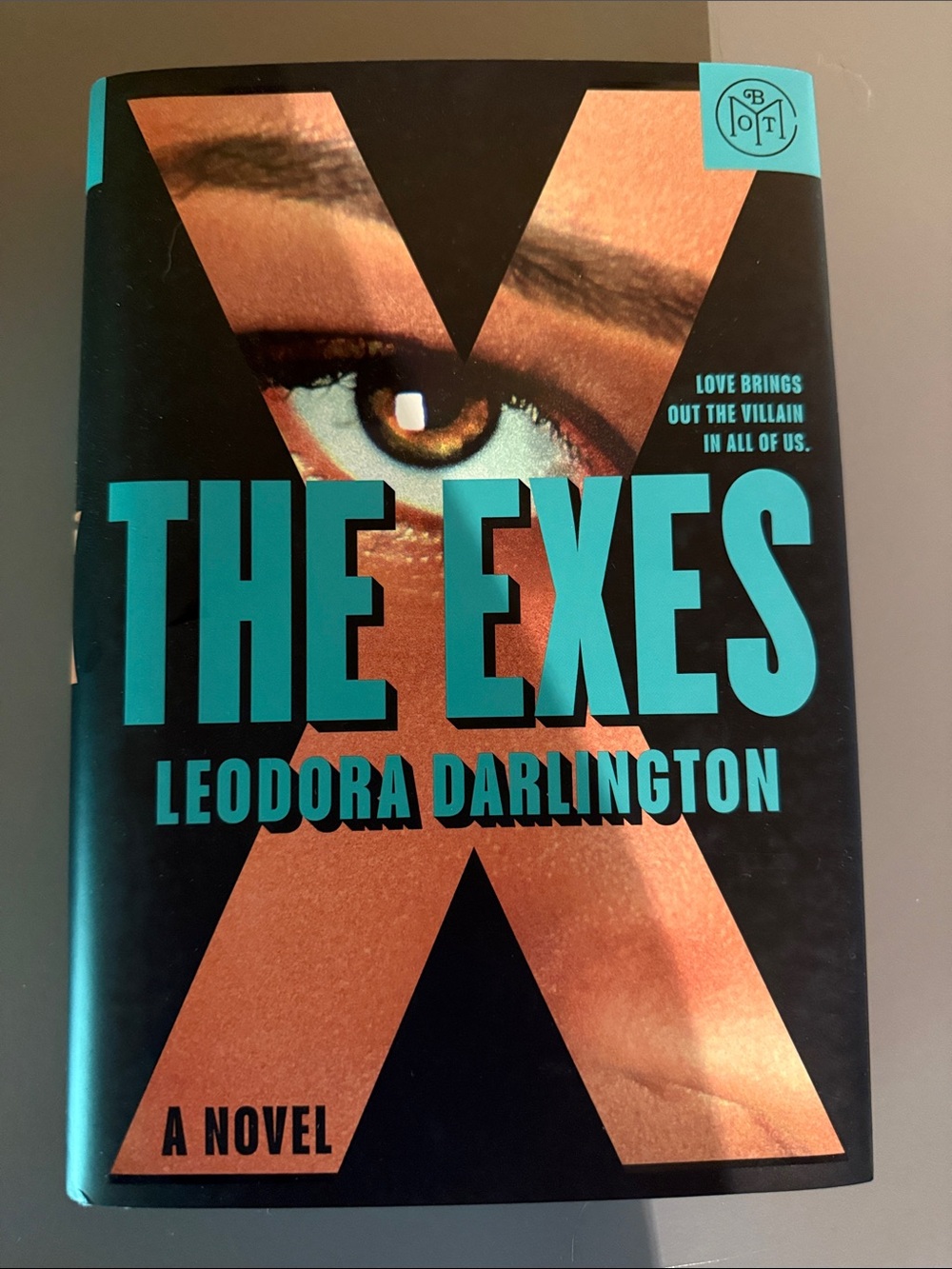 The Exes by Leodora Darlington - Teal & Copper Hardcover Novel
